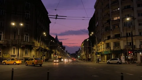 Road traffic in the evening in Bucharest, Romania. Stock Footage 125780396