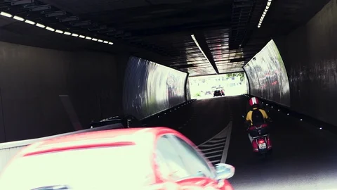 Road traffic going through a tunnel in Zurich Stock Footage 114840954
