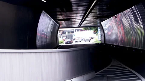 Road traffic going through a tunnel in Zurich Stock Footage 114842228