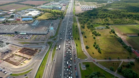Road traffic on highway at sunlight with clouds. Way to work concept. Top view. Stock Footage 139778333