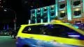 Road traffic near hotel with night illumination in Pattaya, Thailand HD Footage