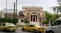 Road traffic near statue of General Theodoros Kolokotronis in Athens, Greece HD Footage