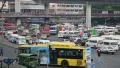 Road traffic near Victory Monument in Bangkok, Thailand HD Footage