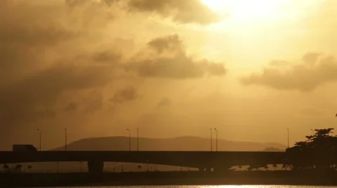 Road traffic over bridge at sunrise. Stock Footage 68451908