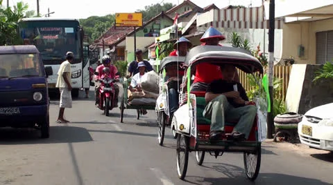 Road traffic at the small town of Java island, Indonesia Video stock 25489709