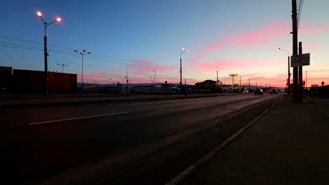  Road traffic at sunset Stock Footage 76442095