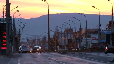 Road traffic at sunset Stock Footage 76442441