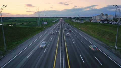 Road traffic at sunset timelapse Stock Footage 76203632
