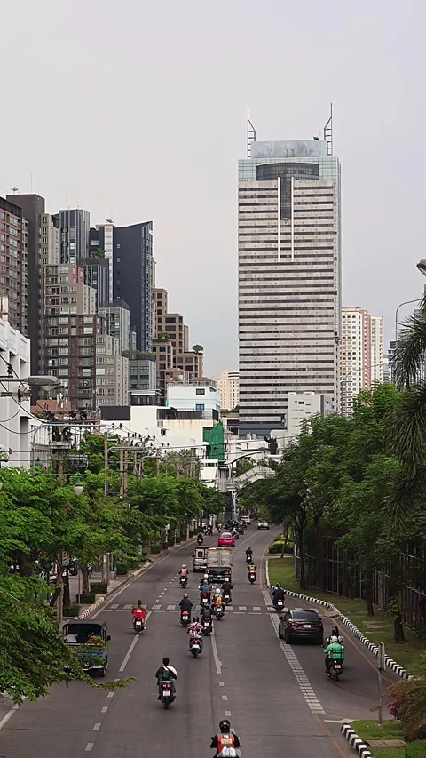Road traffic at Taksin Intersection. Vertical video. Stock Footage 278852174