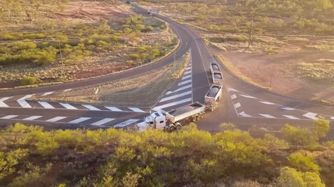 Road Train 4 Trailer turning onto highway Chillagoe Queensland Stock Footage 160454382