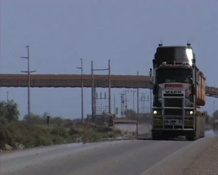 Road train close up right to left- Port Hedland- Australia Stock Footage 8578680