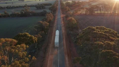 Road Train Driving Down Australian Rural Road Stock Footage