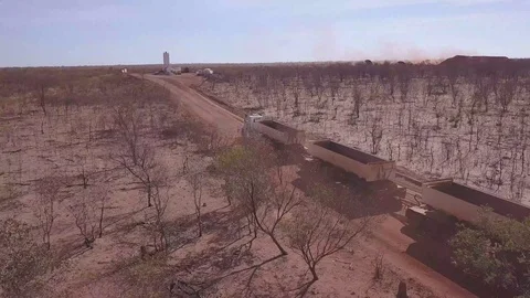 Road Train on Dusty Road 2, Australia Stock Footage 124100735