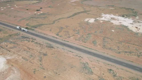 Road Train On the Remote Desert Outback Road in South Australia - Tracking Stock Footage 312686486