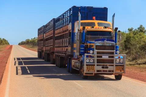 Road train with three double deck stock trailers Stock Photos