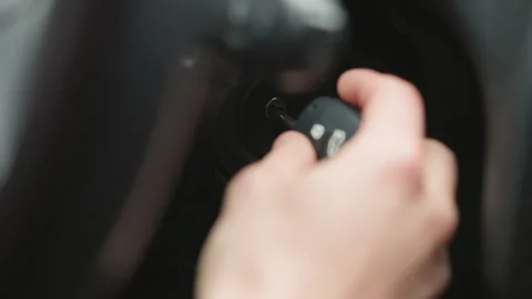 Road Traveler Inserting Key Into Ignition Starter And Turning To Start Engine Stock Footage 310515507