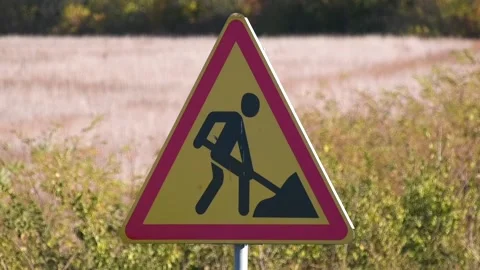 Road triangular sign Attention, road works are in progress Stock Footage 292414813