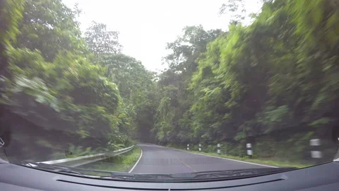 Road trip by car during raining Stock Footage 283014240