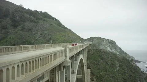 Road trip drive on PCH with bridge California coastline Stock Footage 145887232