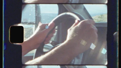 Road Trip Hands On Steering Wheel Vintage 8mm Film 4K Scan Stock Footage