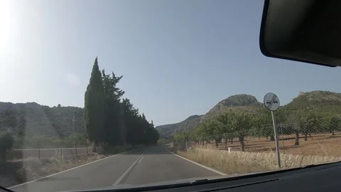 Road Trip POV: Driving on Empty Scenic Road Through Mallorca Mountains Stock Footage 333326016