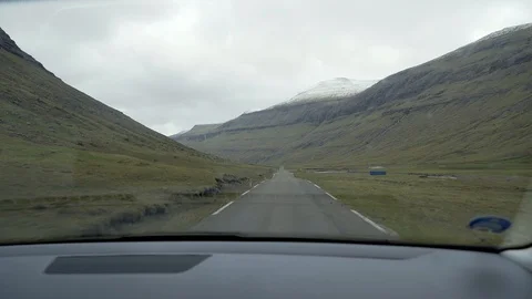 Road trip through snow-covered valleys on the Faroe Islands. Stock-Footage 123695457