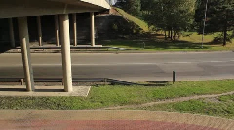 Road under bridge with light traffic Stock Footage 12256296