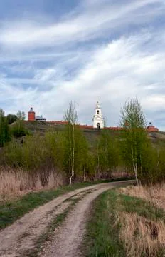 The road under the hill leads to the monastery walls Stock Photos