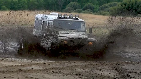 Off-road vehicle in the mud Stock Footage 245851910