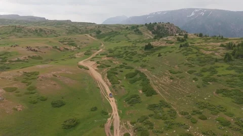 Off road vehicle traversing mountain path Video stock 312451410