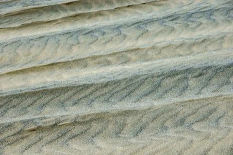 Off-road vehicle tyre track patterns in sand-dunes at Ripiro Beach near Pou.. Stock Photos