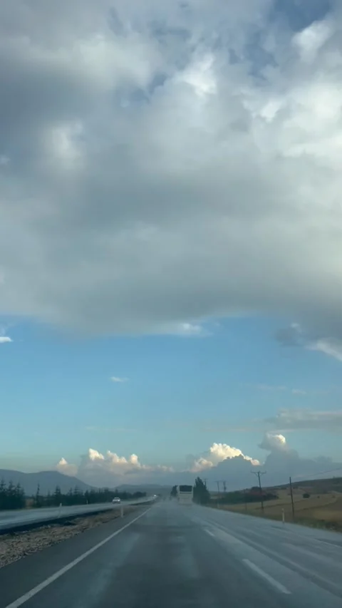 Road view with clouds while driving under rain Stock Footage 337133149