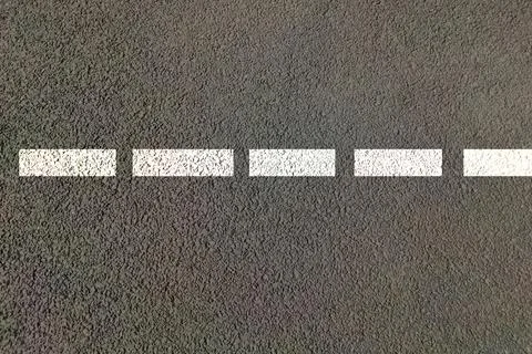 Road view with lines on white dash lines across Highway for two side traffic Stock Photos