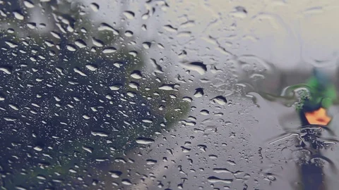 Road view through car windshield with rain drops, Driving in rain. Stock Footage