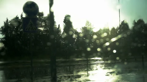 Road view through car windshield with rain drops Stock Footage 86203876
