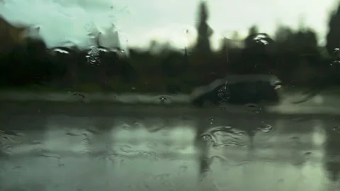 Road view through car windshield with rain drops Stock Footage 86209942