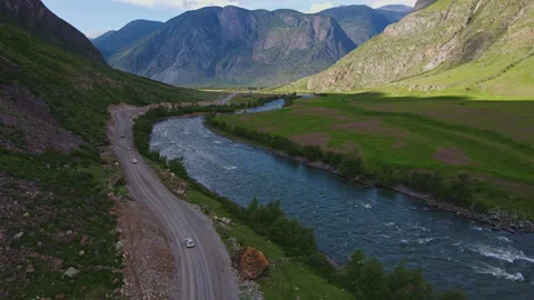 Road with views of the mountains and the river Stock Footage 245621184