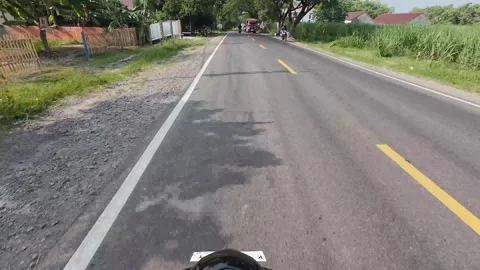 Road views in the sub district in Blora, Central Java, Indonesia Stock Footage 317065791