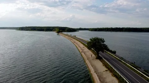 Road washed by the lake Stock Footage 203895611