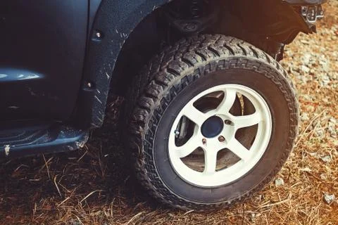 Off-road wheel in mud Stock Photos