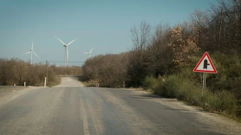 Road with Wind Turbines Stock Footage 282935247