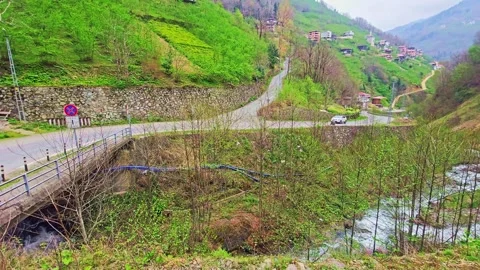 A road that is winding through a valley Stock Footage 272773949