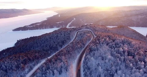 The road in the winter forest.Aerial view. Stock Footage 69958728