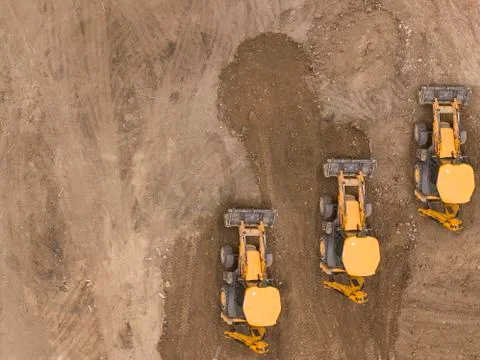 Road work. Large machine work on a new road construction site. Aerial view from Foto stock