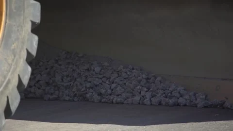 Road work, machine bucket with stones, crushed stone Stock Footage 276965812