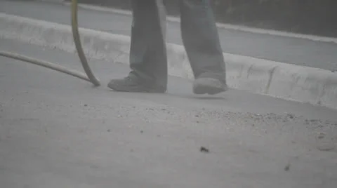 Road worker cleaning dust Stock Footage 24821681