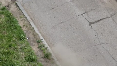Road worker cleans old asphalt with blower for laying new asphalt, road repair Stock Footage 131589555