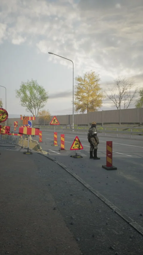 Road worker managing traffic and construction near city highway at sunset Stock Footage 327180795