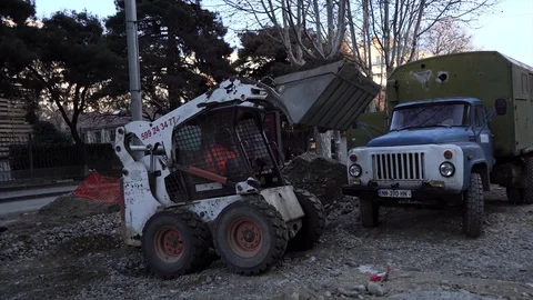 Road Worker performs the job Stock Footage 124540694