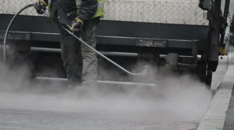 Road worker reparing road Stock-Footage 24821902